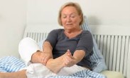 Older couple on a bed